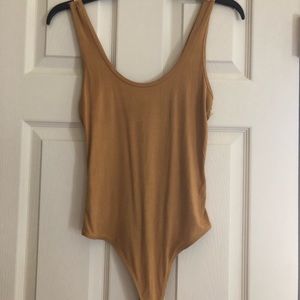 Muted yellow onesie!